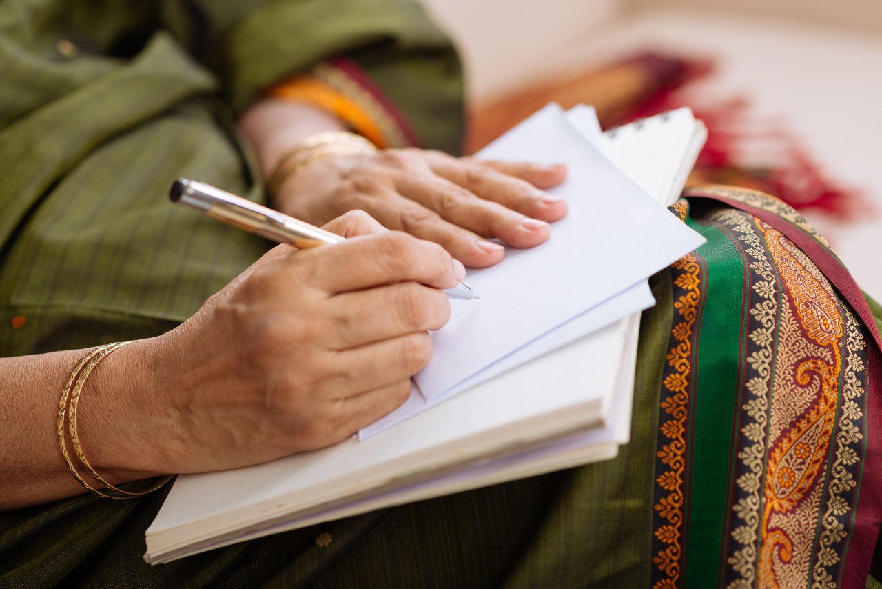 Senior woman writing a letter