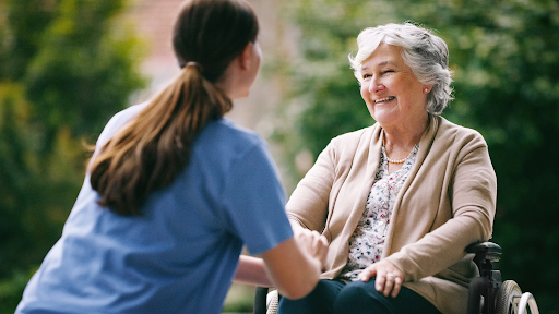 senior woman with her memory care caregiver