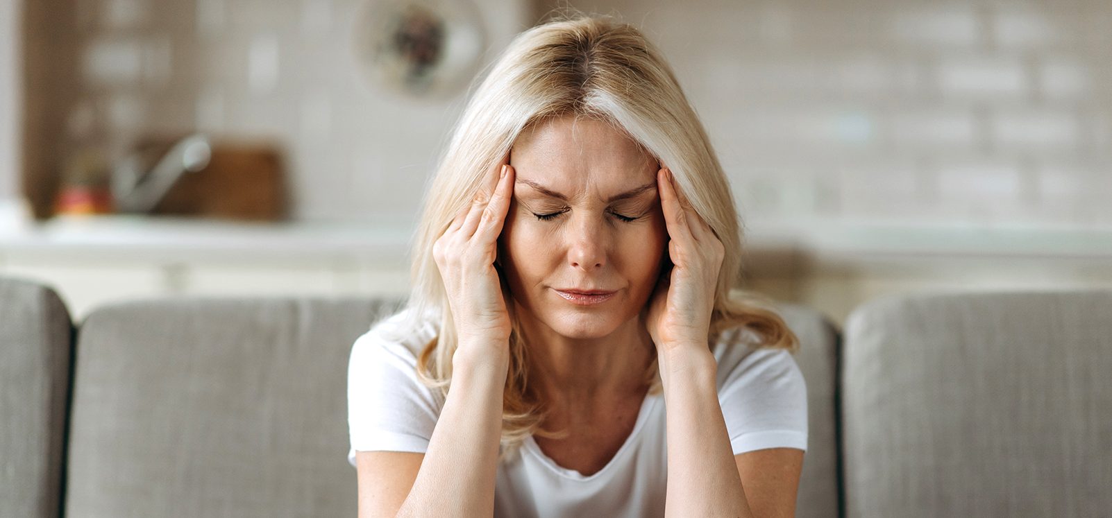 stressed woman on couch