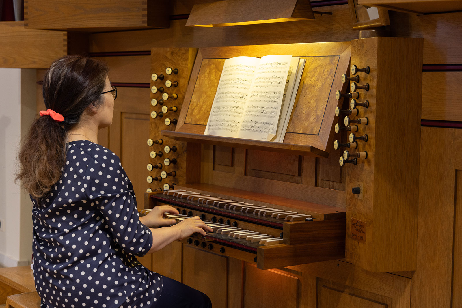 Woman playing an organ